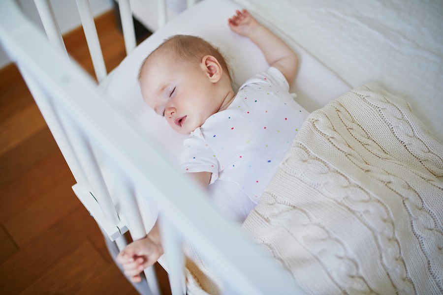 Baby Sleeping In Co Sleeper Crib Attached To Parents Bed Echte